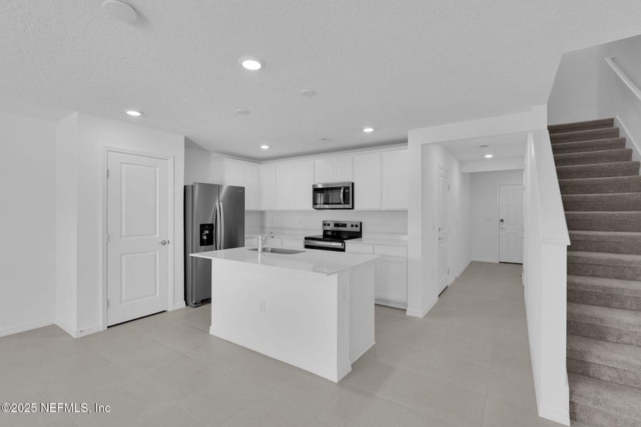 Furnished interior view inside a new home in , Jacksonville (Image 7). Furnished interior view inside a new home in , Jacksonville (Image 7).