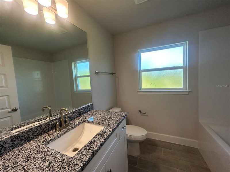 Furnished interior view inside a new home in Deep Creek, Punta Gorda (Image 9).