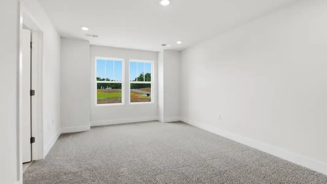 Representative unfurnished interior of a home built from the Denver by D.R. Horton in Ashmore Hills, Mauldin (Image 28).