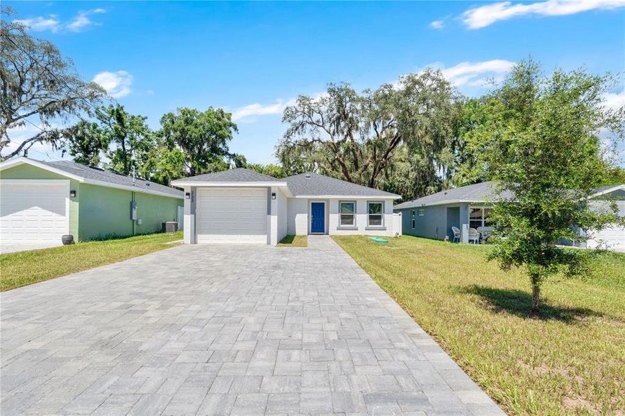 Front exterior of a new home in , Apopka, FL, highlighting curb appeal (Image 20). Front exterior of a new home in , Apopka, FL, highlighting curb appeal (Image 20).