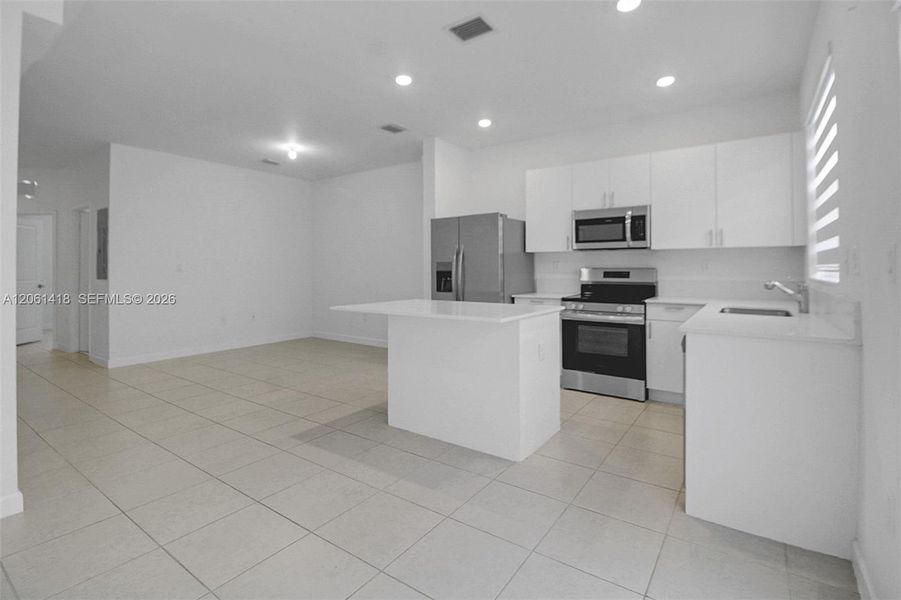 Furnished interior view inside a new home in , Homestead (Image 6). Furnished interior view inside a new home in , Homestead (Image 6).