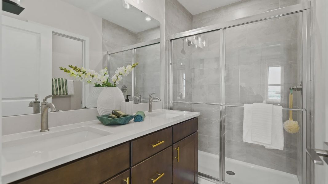 Atlantic Plan Single Story Home by DRB Homes, Primary Suite en suite bath in Liberty Trace in Haines City, FL Atlantic Plan Single Story Home by DRB Homes, Primary Suite en suite bath in Liberty Trace in Haines City, FL