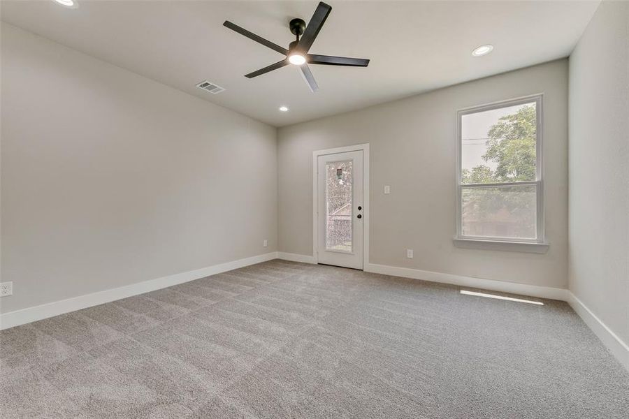 Primary Bedroom with access to the patio Primary Bedroom with access to the patio