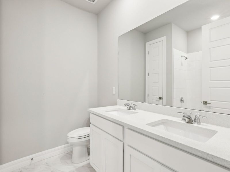 Furnished interior view inside a new home in Crescent Lakes - Reserve Series, Punta Gorda (Image 8).