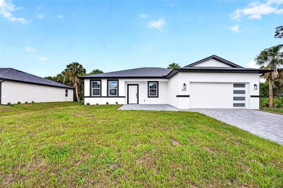 Exterior details and patio area of a home in , North Port (Image 25).