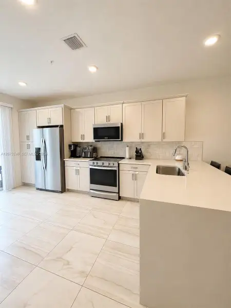 Furnished interior view inside a new home in , Pembroke Pines (Image 4).