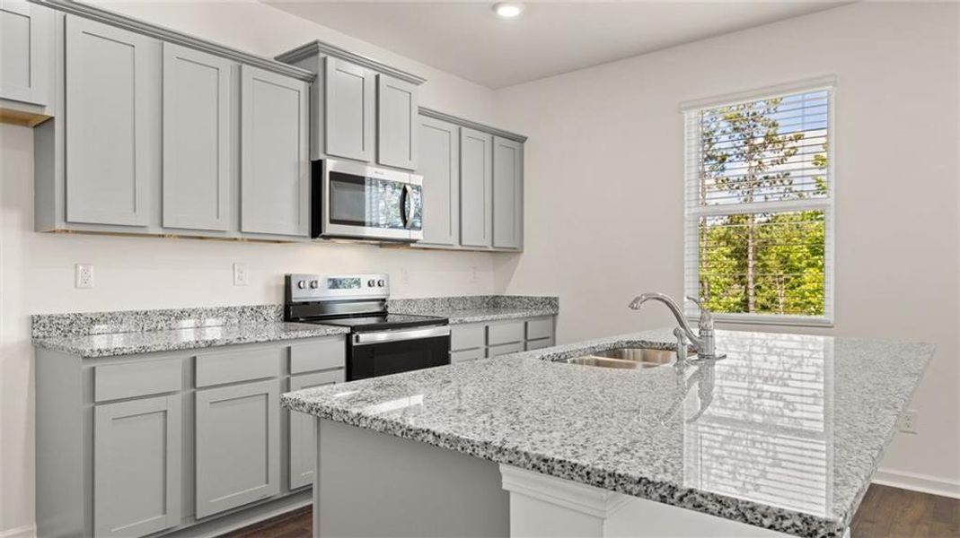 Furnished interior view inside a new home in Fox Crossing, Griffin (Image 4).