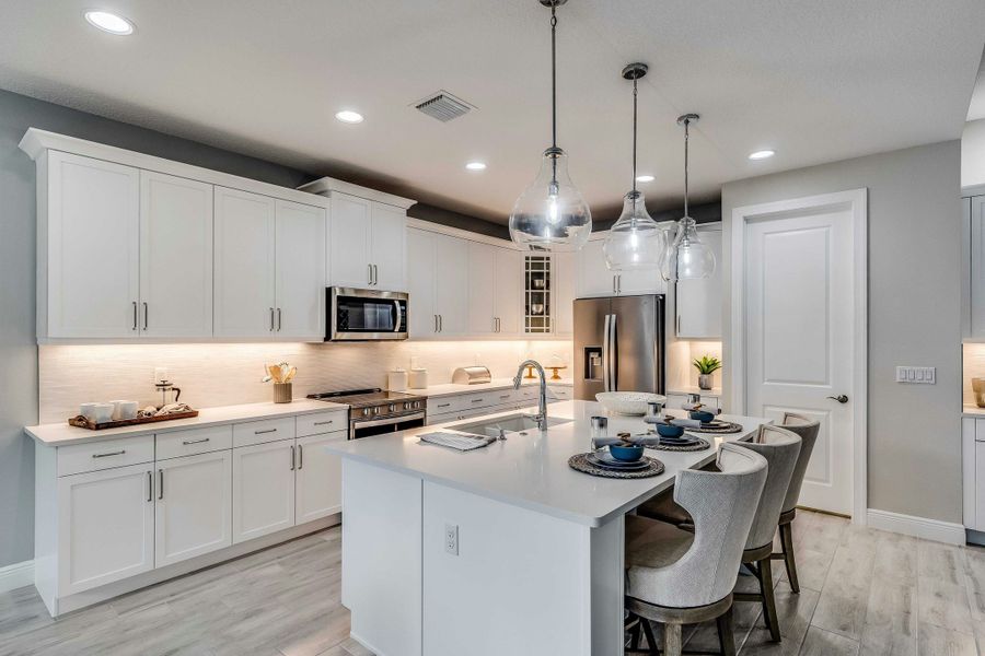 Representative furnished interior of a home built from the Allura by GHO Homes in High Pointe, Vero Beach (Image 20).