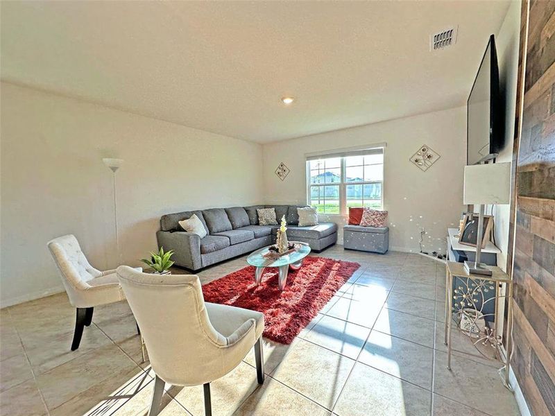 Furnished interior view inside a new home in , Harmony (Image 14).