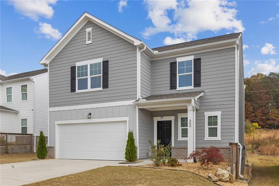Front exterior of a new home in , Winder, GA, highlighting curb appeal (Image 23).
