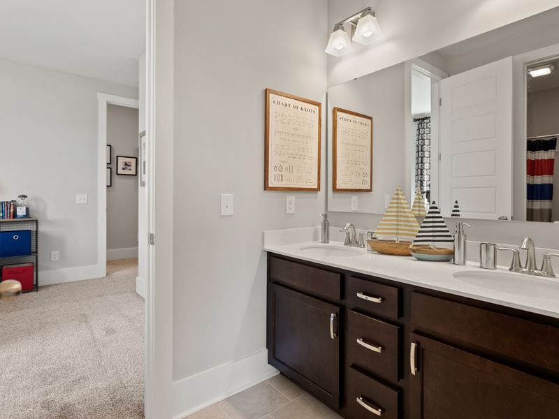 Representative furnished interior of a home built from the Riley P by True Homes in Homecoming, Ravenel (Image 16).