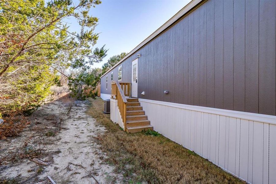 Exterior details and patio area of a home in , Granbury (Image 2). Exterior details and patio area of a home in , Granbury (Image 2).