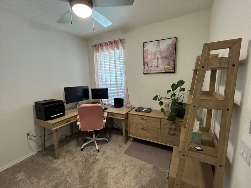 Secondary bedroom currently being used as an office. Secondary bedroom currently being used as an office.