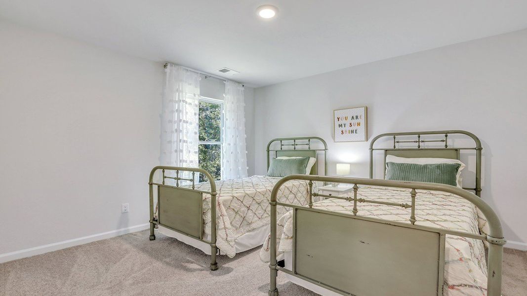 Representative furnished interior of a home built from the ROBIE by D.R. Horton in Longleaf Village, Rincon (Image 32).