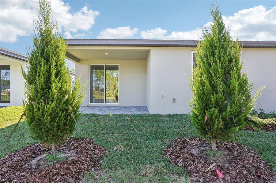Exterior details and patio area of a home in Ridgehaven - Villas, Ormond Beach (Image 20).