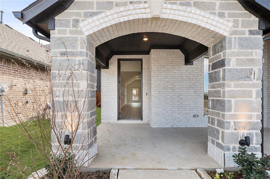 Exterior details and patio area of a home in Creekview Meadows, Pilot Point (Image 3).
