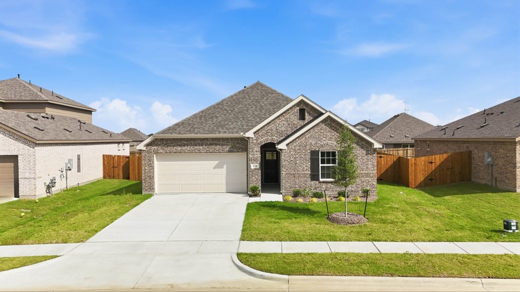 Front exterior of a new home in Patriot Estates, Venus, TX, highlighting curb appeal (Image 22).