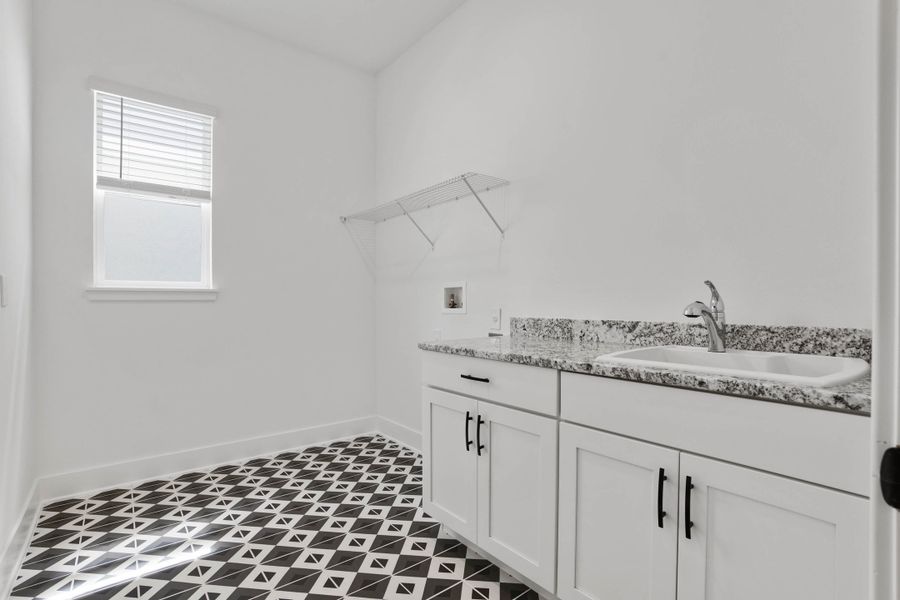 Representative furnished interior of a home built from the Hemingway by Rockwell Homes in Northlake At Ovation, Winter Garden (Image 5).