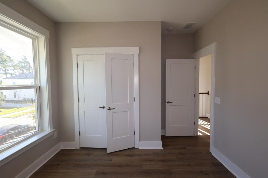 Spacious, unfurnished interior of a new home in Point Hope - Cottage Collection, Charleston (Image 25). Spacious, unfurnished interior of a new home in Point Hope - Cottage Collection, Charleston (Image 25).