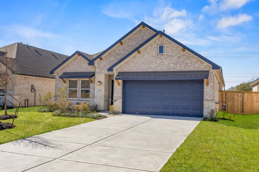 Front exterior of a new home in Ashland, Houston, TX, highlighting curb appeal (Image 17).