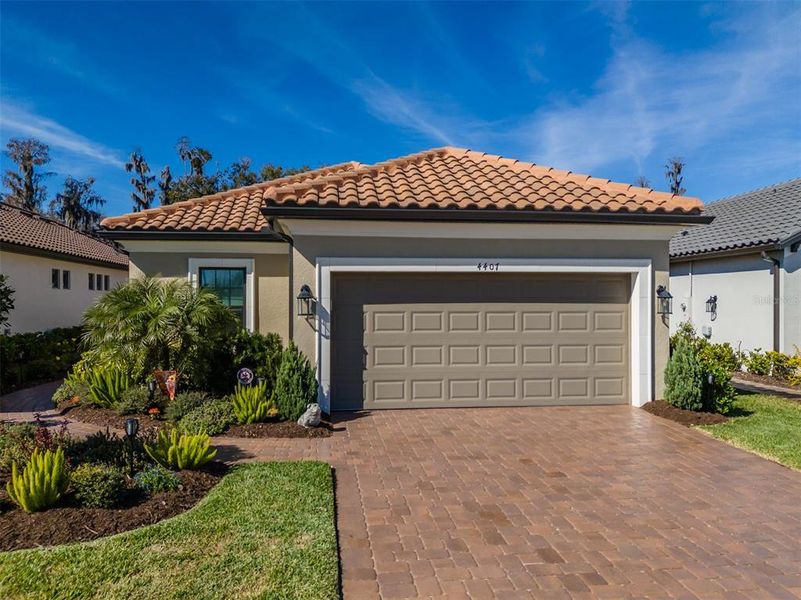 Front exterior of a new home in , Wesley Chapel, FL, highlighting curb appeal (Image 2). Front exterior of a new home in , Wesley Chapel, FL, highlighting curb appeal (Image 2).