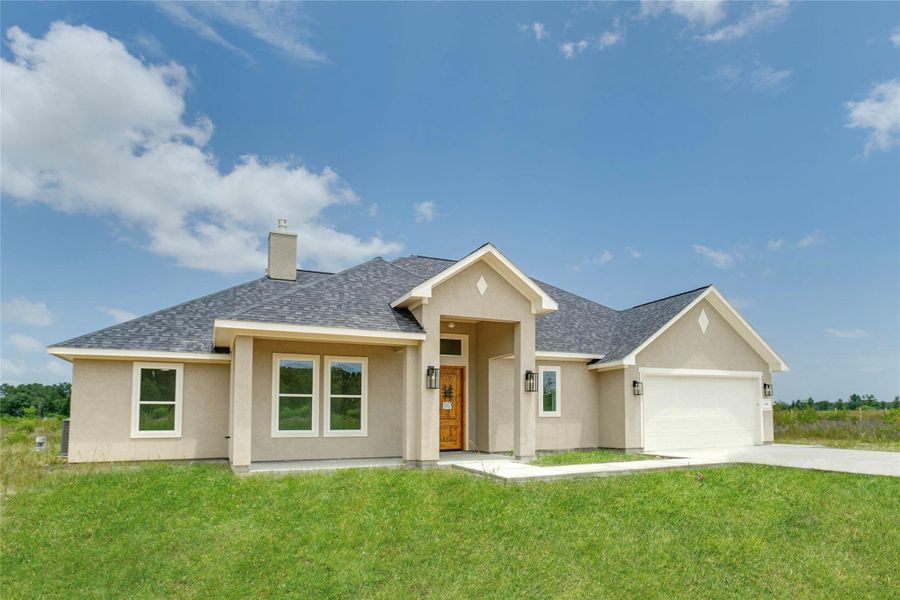 Front exterior of a new home in , Dayton, TX, highlighting curb appeal (Image 3).