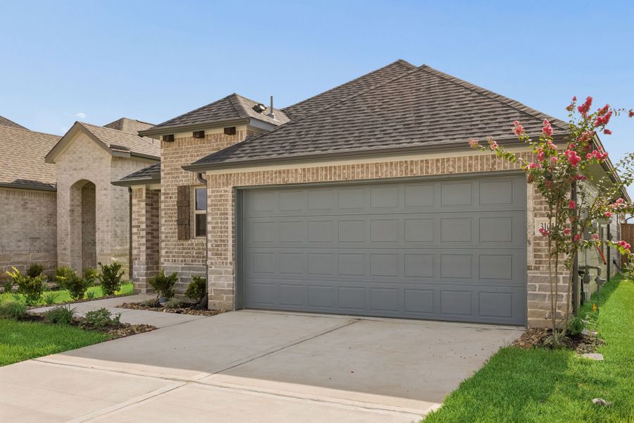Front exterior of a new home in Riviera Pines, Huffman, TX, highlighting curb appeal (Image 20).