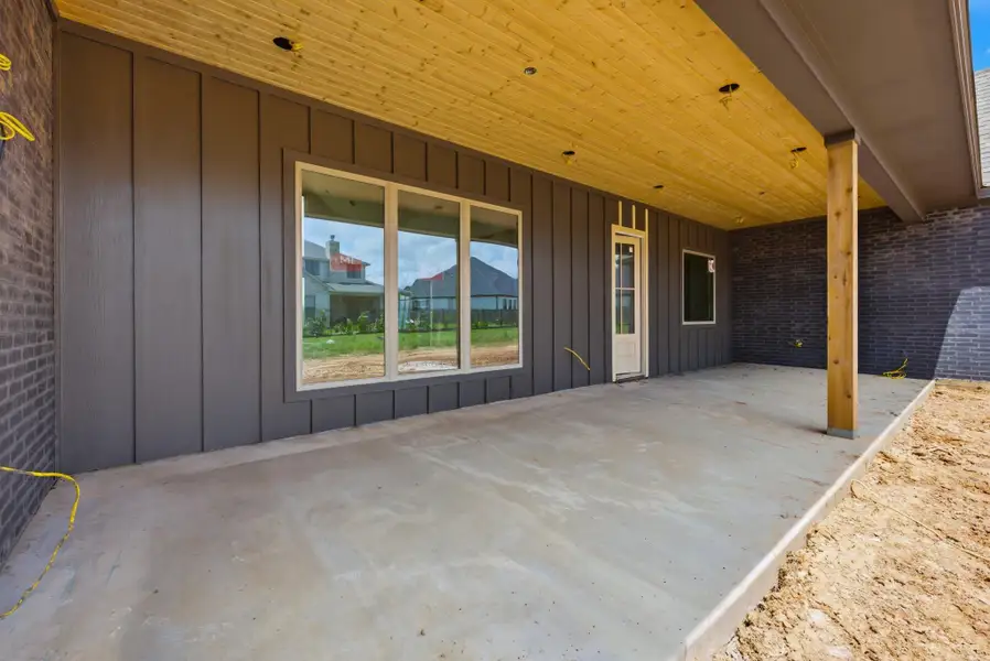 Exterior details and patio area of a home in , College Station (Image 3).