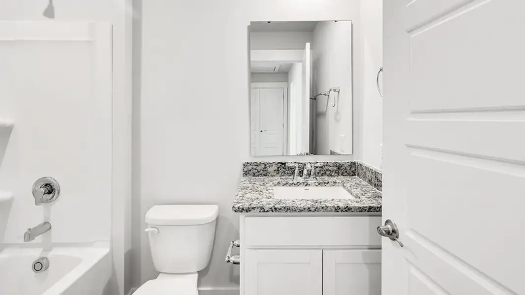 Furnished interior view inside a new home in The Cove at Indigo Preserve Townhomes, Leland (Image 7).