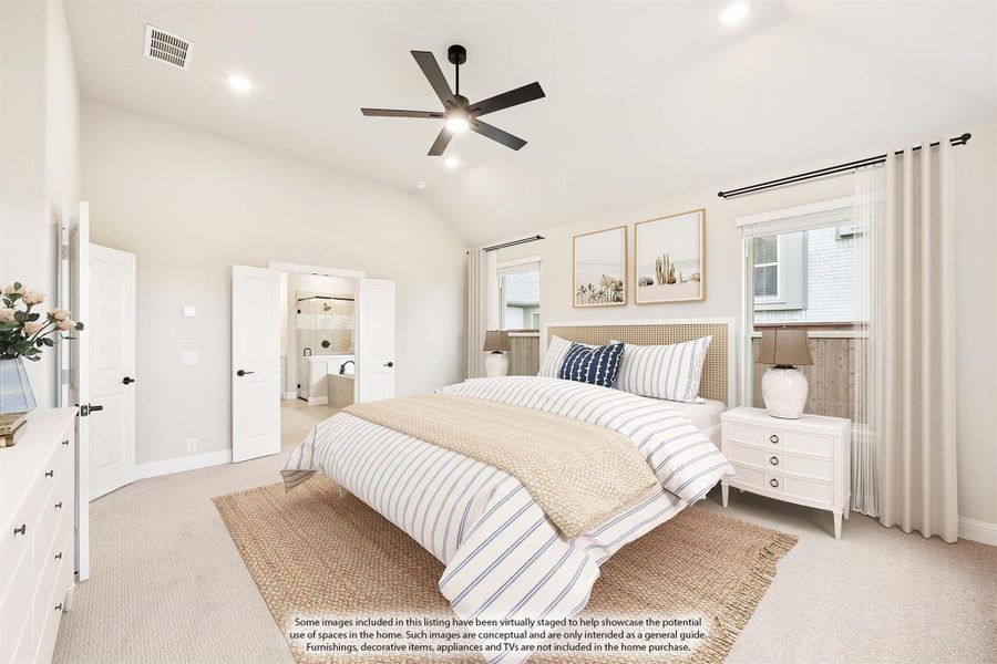 Spacious master bedroom with vaulted ceiling, ceiling fan, and ensuite bathroom access