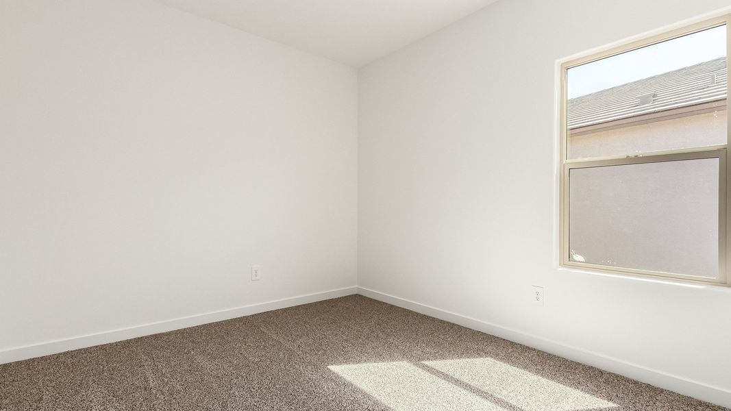 Spacious, unfurnished interior of a new home in Barnett Village, Marana (Image 25).