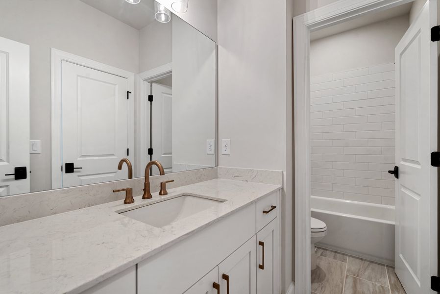 Representative furnished interior of a home built from the 
                        
                         by The Providence Group in Ward's Crossing Townhomes, Johns Creek (Image 7).