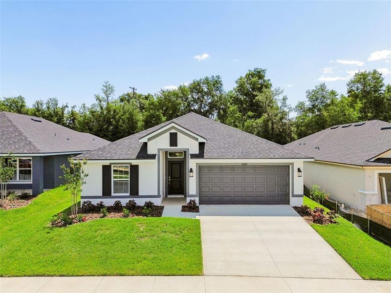 Front exterior of a new home in Abbey Glen, Dade City, FL, highlighting curb appeal (Image 36). Front exterior of a new home in Abbey Glen, Dade City, FL, highlighting curb appeal (Image 36).