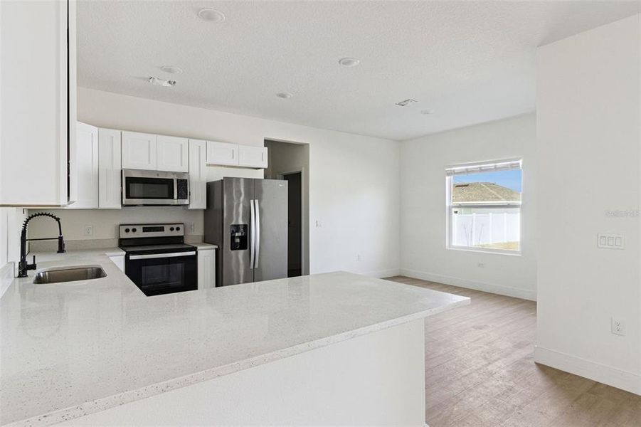 Furnished interior view inside a new home in , Kissimmee (Image 8).