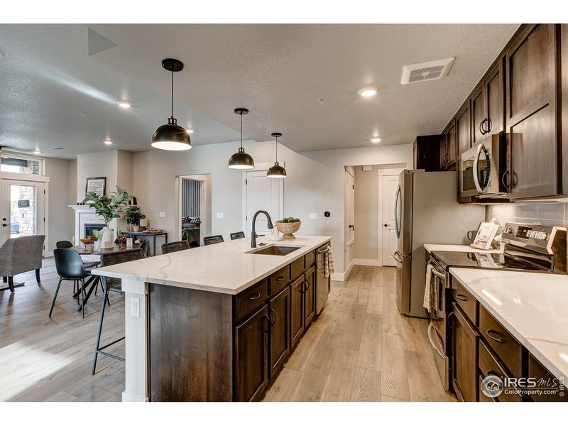 Furnished interior view inside a new home in Northfield at Old Town - Vista Collection, Fort Collins (Image 4).