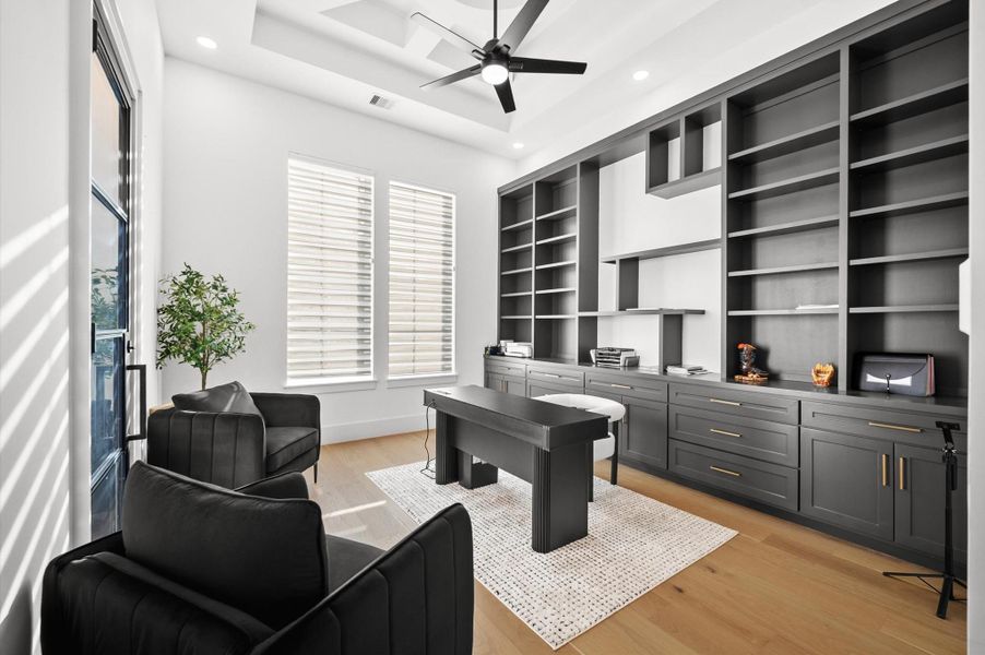 Private office featuring custom built-in cabinetry. Offer separate exterior entrance for added convenience.