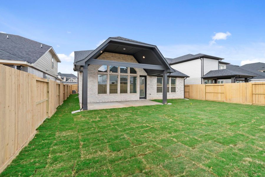 Expansive Patio With Room For Grilling, Hosting, And Relaxing