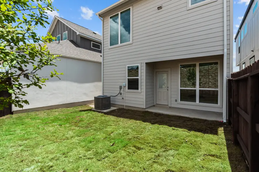 Exterior details and patio area of a home in Centero at Stone Oak, San Antonio (Image 4).
