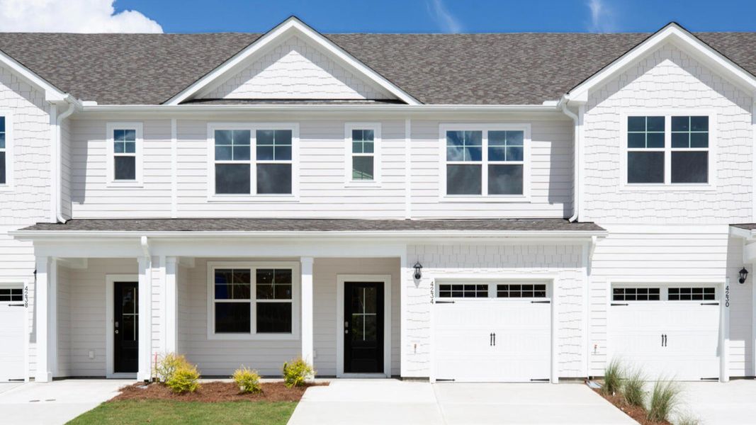 Representative exterior photo of a completed home built from the MARION by D.R. Horton in Indigo Preserve Townhomes, Leland, NC (Image 2).
