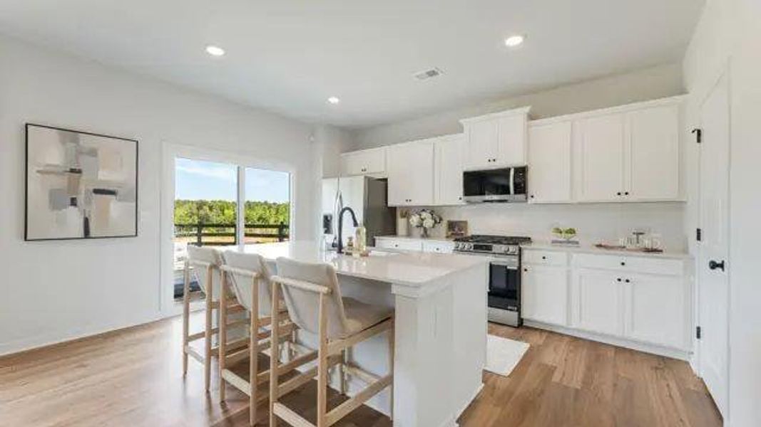 Furnished interior view inside a new home in Reserve at Gum Springs, Jefferson (Image 7).