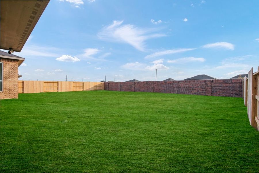 Exterior details and patio area of a home in Avalon at Friendswood 70s, Friendswood (Image 25).