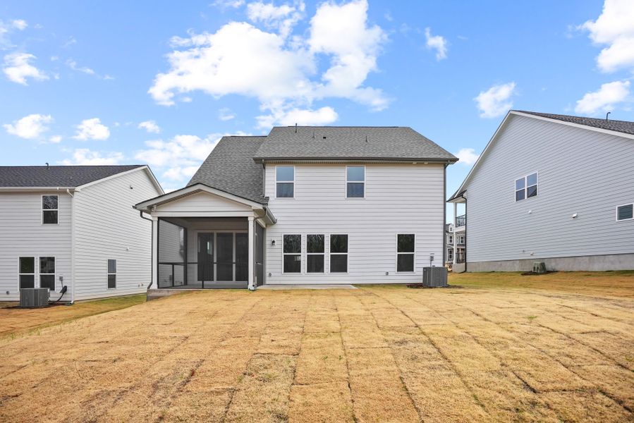 Exterior details and patio area of a home in Forest Creek, Waxhaw (Image 37).