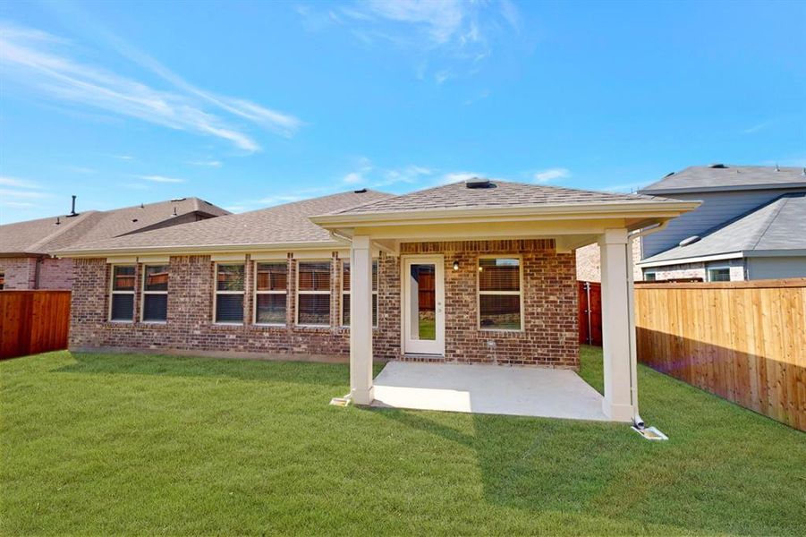 Front exterior of a new home in Mobberly Farms, Pilot Point, TX, highlighting curb appeal (Image 2).