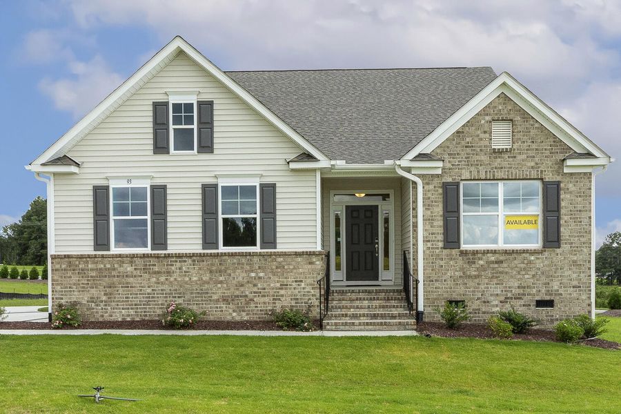 Front exterior of a new home in Berea Farms, Four Oaks, NC, highlighting curb appeal (Image 1).