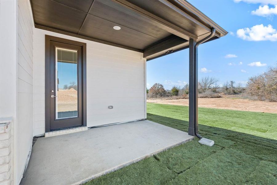 Exterior details and patio area of a home in Saddleback Estates, Boyd (Image 28). Exterior details and patio area of a home in Saddleback Estates, Boyd (Image 28).