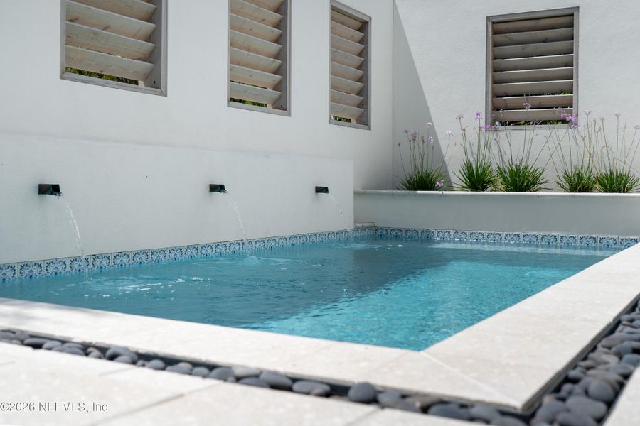 Exterior details and patio area of a home in , Palm Coast (Image 41).