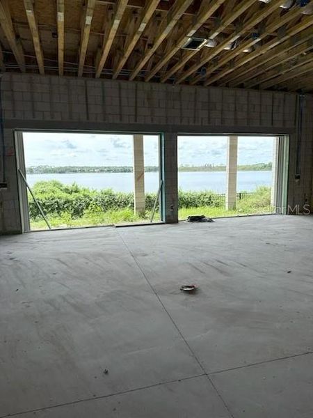 In-progress construction of a new home in Shorefront Cove, Winter Garden, FL (Image 2).