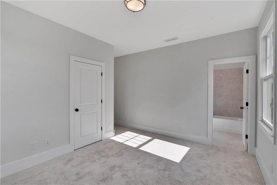 Spacious, unfurnished interior of a new home in Eastmore, Conyers (Image 33).