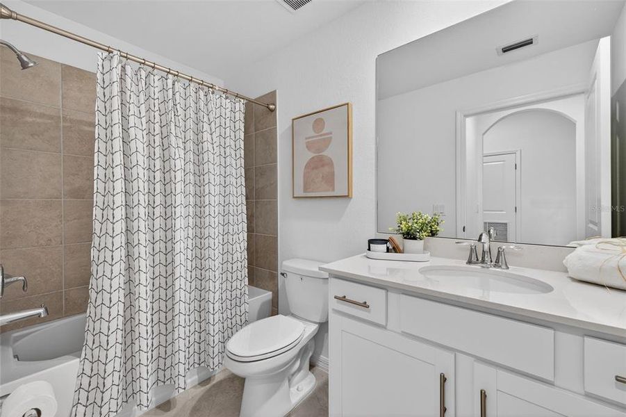 Furnished interior view inside a new home in Heritage Landing, Punta Gorda (Image 18).