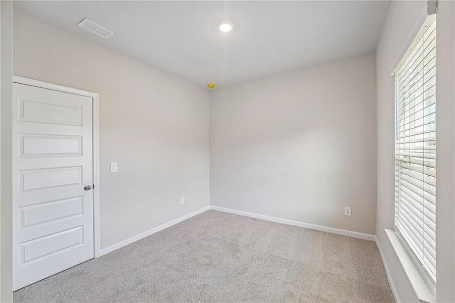 Spacious, unfurnished interior of a new home in Hemingway - Reserve Series, Cumming (Image 52).